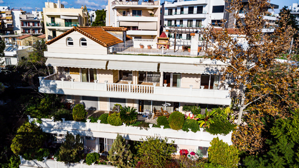 Professional cinematic aerial drone photography of luxury villa